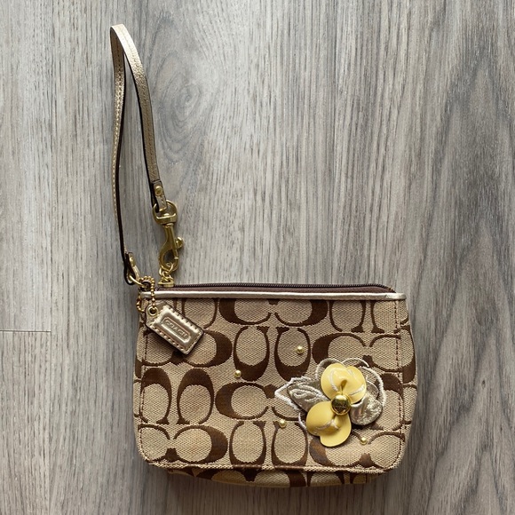 Coach Monogrammed Floral Wristlet - Picture 1 of 5